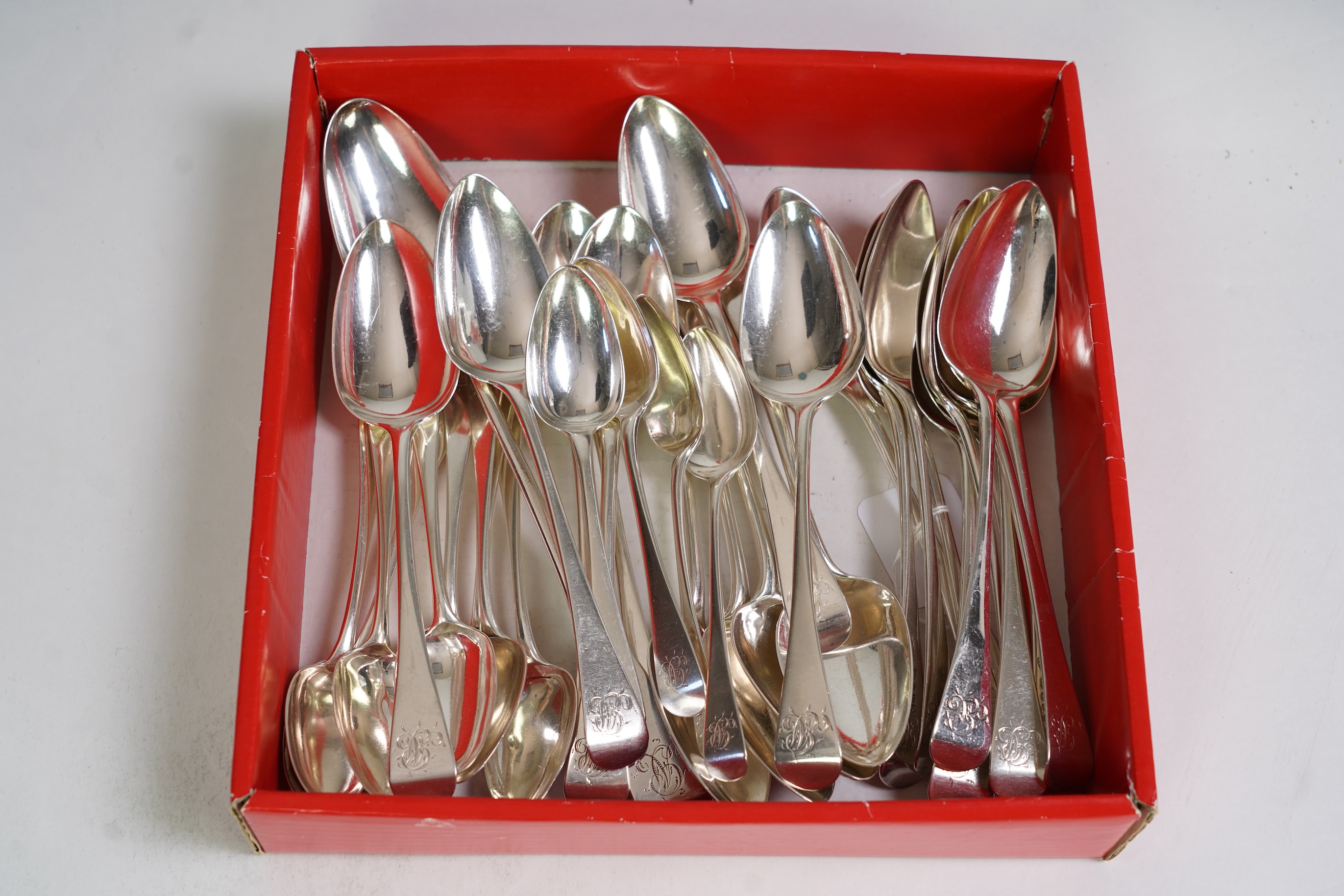 A matched part suite of George III/George IV silver Old English pattern flatware, comprising thirty seven items
